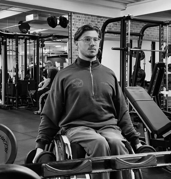 Joshua Mols in his wheelchair in the gym